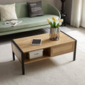 40.16" Rattan Coffee table, sliding door for storage, and metal legs by Blak Hom